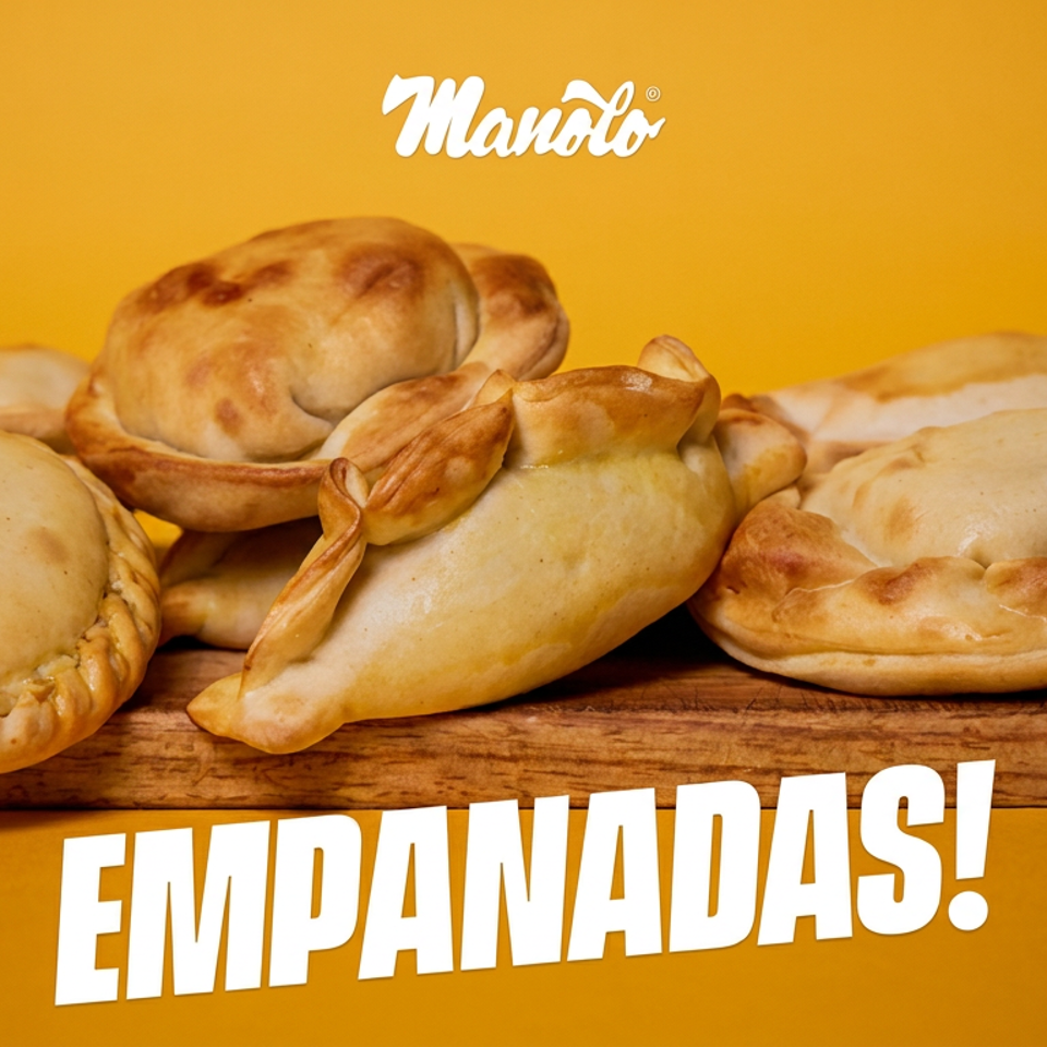 Assortment of golden-brown empanadas arranged on a wooden board against a bright yellow background.